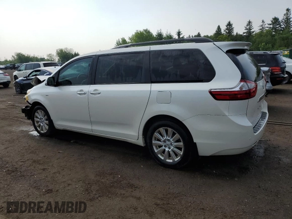 2017 Toyota Sienna XLE with VIN 5TDDZ3DCXHS154284, listed as a Copart auction lot 54932345 with 218,103 mi miles and Salvage title. Bid and sale history available at DreamBid. Image 2.