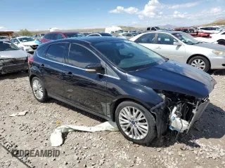 2017 Ford Focus Titanium with VIN 1FADP3N23HL279694, listed as a Copart auction lot 53452725 with 92,740 mi miles and Salvage Title. Bid and sale history available at carsss.com. Image 4.