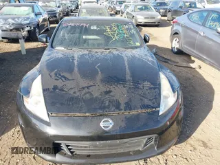 2014 Nissan 370Z with VIN JN1AZ4EH8EM636717, listed as a IAAI auction lot 40751494 with Not Provided miles and . Bid and sale history available at DreamBid. Image 11.