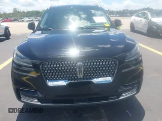 2021 Lincoln Aviator Reserve with VIN 5LM5J7WC0MGL12385, listed as a IAAI auction lot 42472422 with 20,404 mi miles and . Bid and sale history available at DreamBid. Image 6.