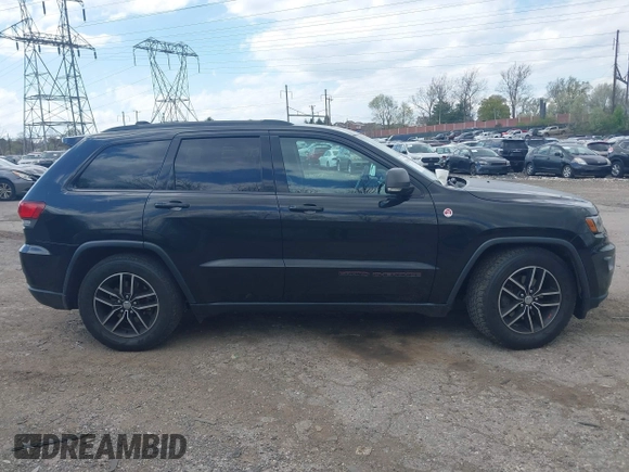 2017 Jeep Grand Cherokee Trailhawk with VIN 1C4RJFLG3HC674489, listed as a IAAI auction lot 42049006 with 91,892 mi miles and . Bid and sale history available at DreamBid. Image 14.