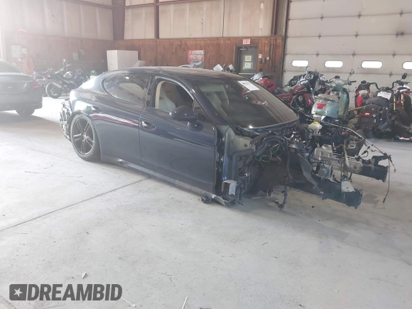 2014 Porsche Panamera GTS with VIN WP0AF2A7XEL083274, listed as a IAAI auction lot 40258451 with 98,861 mi miles and . Bid and sale history available at DreamBid. Image 1.