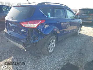 2013 Ford Escape SE with VIN 1FMCU0GX9DUC33969, listed as a IAAI auction lot 41737582 with 132,629 mi miles. Bid and sale history available at carsss.com. Image 4.