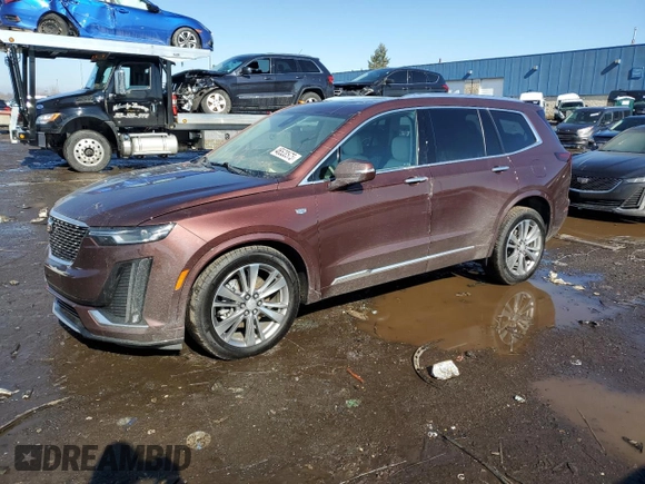 2023 Cadillac XT6 AWD Premium Luxury z VIN 1GYKPDRS0PZ112068, wystawiony jako Copart lot #46538575 z przebiegiem 52 016 mil mil oraz Szkoda całkowita • Salvage title. Historia ofert i sprzedaży dostępna na DreamBid. Obrazek 1.