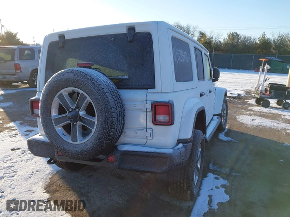 2021 Jeep Wrangler Unlimited Sahara with VIN 1C4HJXEG2MW827385, listed as a IAAI auction lot 41534476 with 29,489 mi miles and . Bid and sale history available at DreamBid. Image 4.