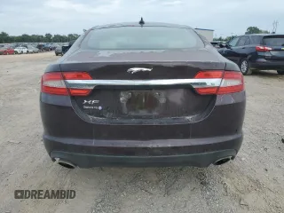 2013 Jaguar XF I4 RWD with VIN SAJWA0ES9DPU02213, listed as a Copart auction lot 69713934 with 104,088 mi miles and Salvage Title. Bid and sale history available at carsss.com. Image 6.