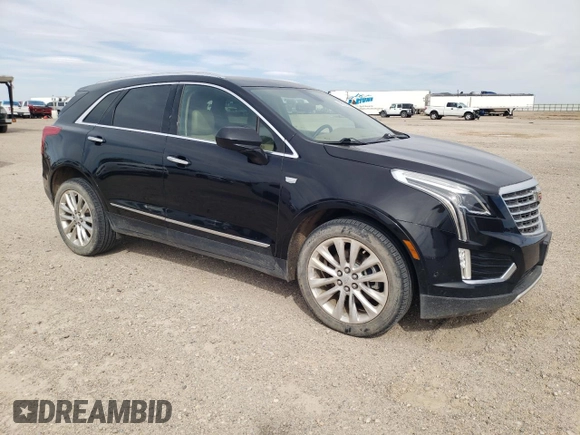 2017 Cadillac XT5 Platinum AWD z VIN 1GYKNFRS1HZ283589, wystawiony jako Copart lot #49140565 z przebiegiem 77 900 mil mil oraz Szkoda całkowita • Salvage title. Historia ofert i sprzedaży dostępna na DreamBid. Obrazek 4.