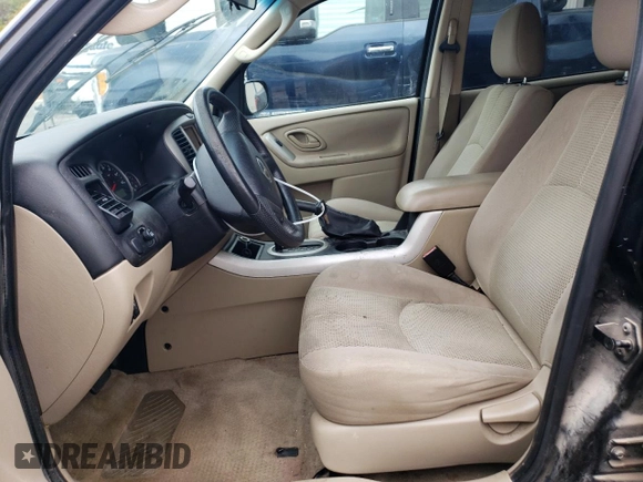 2005 Mazda Tribute S with VIN 4F2YZ04195KM65089, listed as a Copart auction lot 70993244 with Not Provided miles and Salvage Title. Bid and sale history available at DreamBid. Image 7.