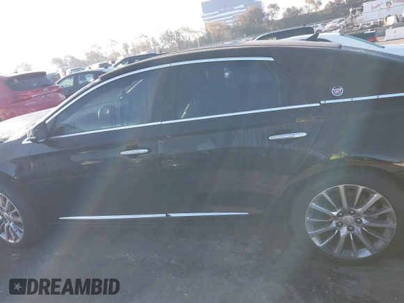 2014 Cadillac XTS Luxury with VIN 2G61M5S31E9290150, listed as a IAAI auction lot 41653055 with 174,553 mi miles and . Bid and sale history available at DreamBid. Image 14.