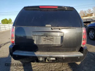 2013 GMC Yukon Denali with VIN 1GKS1EEF0DR205906, listed as a Copart auction lot 87969385 with 128,283 mi miles and Salvage Title. Bid and sale history available at carsss.com. Image 6.