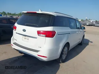 2015 Kia Sedona LX with VIN KNDMB5C10F6027850, listed as a IAAI auction lot 42010344 with 127,019 mi miles. Bid and sale history available at carsss.com. Image 4.