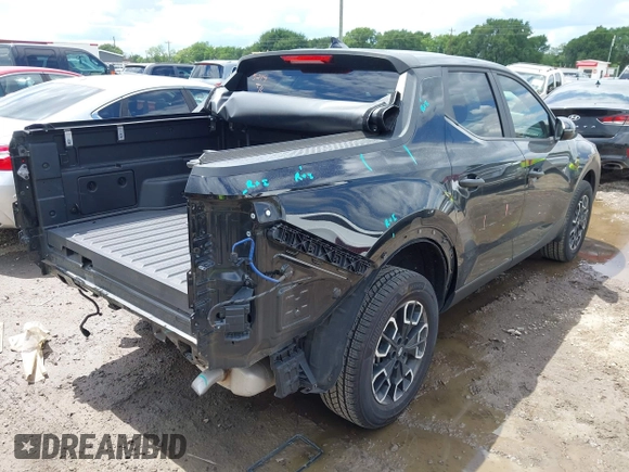 2022 Hyundai Santa Cruz SEL with VIN 5NTJBDAE2NH008015, listed as a IAAI auction lot 42232891 with 31,450 mi miles and . Bid and sale history available at DreamBid. Image 4.