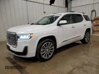 2022 GMC Acadia Denali with VIN 1GKKNXLS4NZ103395, listed as a Copart auction lot 50210155 with 84,404 mi miles and Salvage title. Bid and sale history available at DreamBid. Image 1.