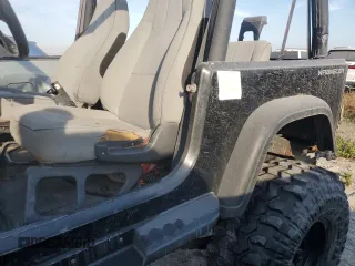 1995 Jeep Wrangler with VIN 1J4FY29S0SP275214, listed as a Copart auction lot 75086344 with 158,912 mi miles and Salvage Title. Bid and sale history available at carsss.com. Image 12.