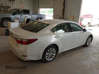 2014 Lexus ES 300h with VIN JTHBW1GG2E2067189, listed as a IAAI auction lot 42404843 with 182,798 mi miles and . Bid and sale history available at DreamBid. Image 4.