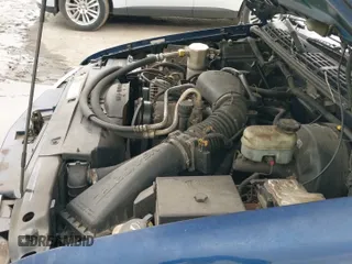 2002 Chevrolet Blazer LS z VIN 1GNCS13W92K202301, wystawiony jako IAAI lot #42066797 z przebiegiem 184 706 mil mil oraz . Historia ofert i sprzedaży dostępna na DreamBid. Obrazek 12.