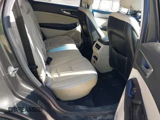 2015 Ford Edge Titanium z VIN 2FMTK3K90FBB13499, wystawiony jako IAAI lot #41492084 z przebiegiem 256 649 mil mil oraz . Historia ofert i sprzedaży dostępna na DreamBid. Obrazek 8.