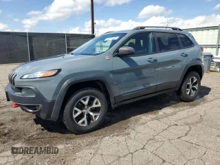 2014 Jeep Cherokee Trailhawk with VIN 1C4PJMBB4EW203320, listed as a Copart auction lot 53875305 with 112,425 mi miles and Clean Title. Bid and sale history available at carsss.com. Image 1.