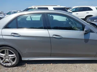 2014 Mercedes-Benz E 350 Sport with VIN WDDHF5KB5EA897093, listed as a IAAI auction lot 42152144 with 120,627 mi miles and . Bid and sale history available at DreamBid. Image 13.