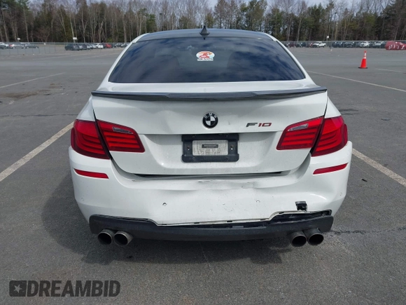 2013 BMW 5 Series 535i xDrive with VIN WBAFU7C51DDU68586, listed as a IAAI auction lot 41939159 with 111,496 mi miles and . Bid and sale history available at carsss.com. Image 6.