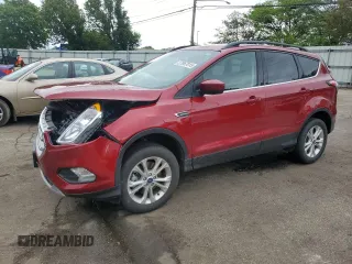 2018 Ford Escape SE z VIN 1FMCU9GD1JUA70398, wystawiony jako Copart lot #57967015 z przebiegiem 33 926 mil mil oraz Szkoda całkowita • Salvage title. Historia ofert i sprzedaży dostępna na DreamBid. Obrazek 1.