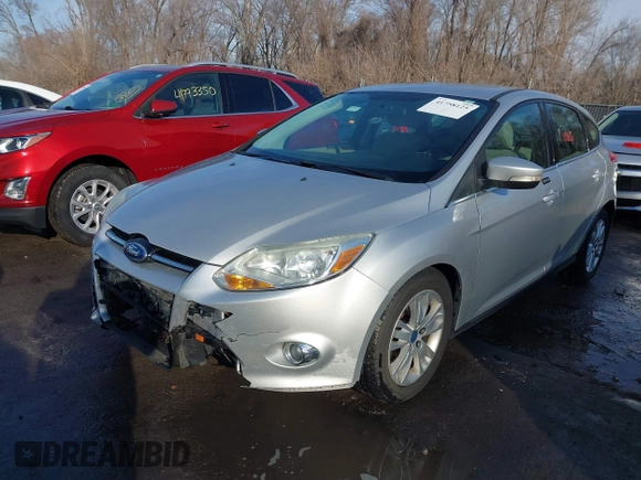 2012 Ford Focus SEL with VIN 1FAHP3M22CL413512, listed as a IAAI auction lot 41758125 with 161,857 mi miles. Bid and sale history available at carsss.com. Image 17.