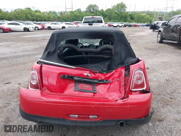 2011 MINI Convertible with VIN WMWZN3C59BTZ89447, listed as a IAAI auction lot 42313009 with 62,009 mi miles and . Bid and sale history available at DreamBid. Image 17.