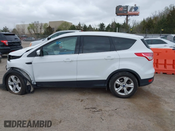 2016 Ford Escape SE with VIN 1FMCU0GX4GUB14442, listed as a IAAI auction lot 41826908 with Not Provided miles and . Bid and sale history available at carsss.com. Image 13.
