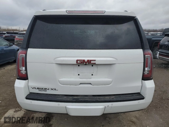 2017 GMC Yukon XL SLE with VIN 1GKS2FKC2HR215016, listed as a Copart auction lot 49651765 with 144,603 mi miles and Salvage Title. Bid and sale history available at carsss.com. Image 6.