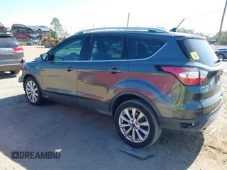 2018 Ford Escape Titanium with VIN 1FMCU0J99JUB09562, listed as a IAAI auction lot 41547659 with 63,700 mi miles and . Bid and sale history available at DreamBid. Image 3.