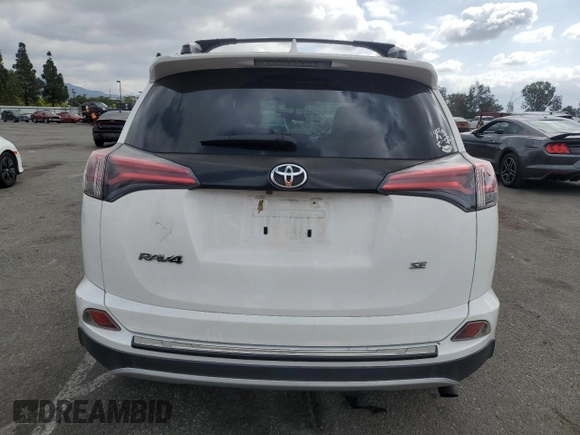 2016 Toyota RAV4 SE with VIN 2T3NFREV4GW263191, listed as a Copart auction lot 54722135 with Not provided miles and Salvage title. Bid and sale history available at DreamBid. Image 6.