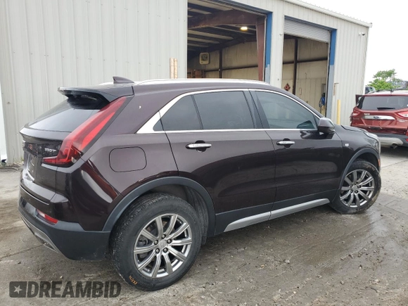2020 Cadillac XT4 AWD Premium Luxury z VIN 1GYFZDR41LF025434, wystawiony jako Copart lot #55169805 z przebiegiem Nie podano mil oraz Szkoda całkowita • Salvage title. Historia ofert i sprzedaży dostępna na DreamBid. Obrazek 3.