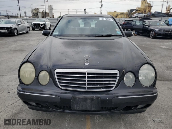 2002 Mercedes-Benz E-Class with VIN WDBJF65J42B486633, listed as a Copart auction lot 76979054 with 151,429 mi miles and Salvage Title. Bid and sale history available at carsss.com. Image 5.