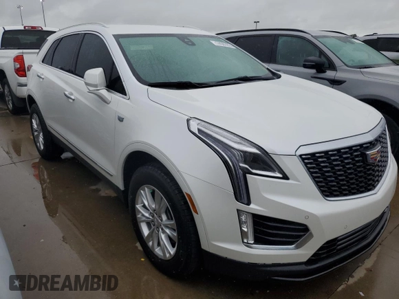 2022 Cadillac XT5 FWD Luxury z VIN 1GYKNAR48NZ163921, wystawiony jako Copart lot #74507874 z przebiegiem 5 723 mil mil oraz Nie do naprawy • Non repairable. Historia ofert i sprzedaży dostępna na DreamBid. Obrazek 4.
