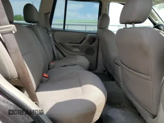 2004 Jeep Grand Cherokee Laredo with VIN 1J4GW48S64C121057, listed as a Copart auction lot 67765474 with 166,359 mi miles and Salvage title. Bid and sale history available at DreamBid. Image 11.