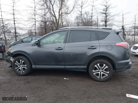 2018 Toyota RAV4 LE with VIN JTMBFREV0JJ223957, listed as a IAAI auction lot 41652810 with 144,629 mi miles. Bid and sale history available at carsss.com. Image 14.