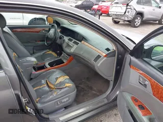 2007 Toyota Avalon XL with VIN 4T1BK36B77U213734, listed as a IAAI auction lot 41956181 with 223,857 mi miles. Bid and sale history available at carsss.com. Image 5.