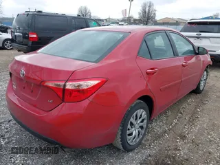 2019 Toyota Corolla L with VIN 2T1BURHEXKC228937, listed as a IAAI auction lot 41979191 with 107,413 mi miles and . Bid and sale history available at carsss.com. Image 4.