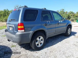 2006 Ford Escape XLT with VIN 1FMYU031X6KB00529, listed as a IAAI auction lot 42142206 with 125,462 mi miles and . Bid and sale history available at DreamBid. Image 4.
