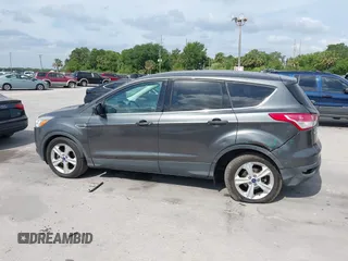 2015 Ford Escape SE with VIN 1FMCU0G7XFUA89965, listed as a IAAI auction lot 42072553 with 129,877 mi miles. Bid and sale history available at carsss.com. Image 14.