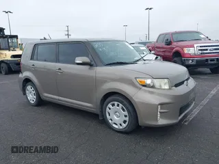 2014 Scion xB with VIN JTLZE4FEXEJ064667, listed as a IAAI auction lot 41583451 with 133,885 mi miles. Bid and sale history available at carsss.com. Image 1.