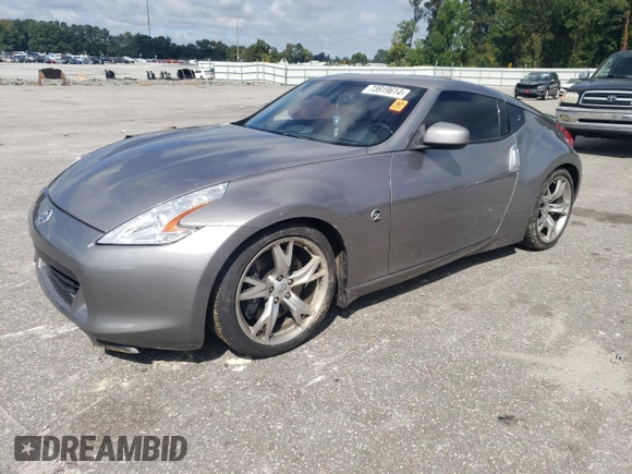 2010 Nissan 370Z Touring with VIN JN1AZ4EH8AM501134, listed as a Copart auction lot 73919614 with 106,599 mi miles and Salvage Title. Bid and sale history available at carsss.com. Image 1.