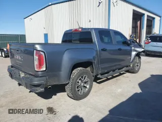 2021 GMC Canyon 4WD AT4 w/Leather with VIN 1GTG6FEN3M1180062, listed as a Copart auction lot 48116395 with 73,933 mi miles and Salvage Title. Bid and sale history available at carsss.com. Image 3.