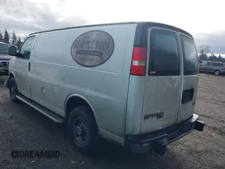 2014 GMC Savana Cargo Van with VIN 1GTW7FCA0E1915445, listed as a IAAI auction lot 41589958 with 279,942 mi miles. Bid and sale history available at carsss.com. Image 3.
