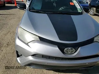 2018 Toyota RAV4 XLE with VIN 2T3RFREV5JW731373, listed as a Copart auction lot 51917465 with 124,623 mi miles and Salvage Title. Bid and sale history available at DreamBid. Image 12.