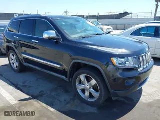 2012 Jeep Grand Cherokee Overland with VIN 1C4RJFCT7CC185602, listed as a IAAI auction lot 42018715 with 91,507 mi miles. Bid and sale history available at carsss.com. Image 1.