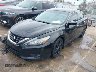 2017 Nissan Altima S z VIN 1N4AL3AP2HC274339, wystawiony jako IAAI lot #41754481 z przebiegiem 104 571 mil mil oraz . Historia ofert i sprzedaży dostępna na DreamBid. Obrazek 17.