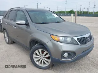 2011 Kia Sorento EX with VIN 5XYKU3A14BG100573, listed as a IAAI auction lot 42084108 with 245,187 mi miles. Bid and sale history available at carsss.com. Image 1.