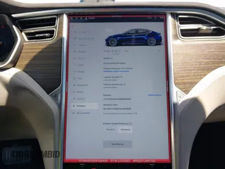 2016 Tesla Model S 70 kWh Battery with VIN 5YJSA1E10GF126433, listed as a IAAI auction lot 42169558 with 120,182 mi miles and . Bid and sale history available at carsss.com. Image 7.