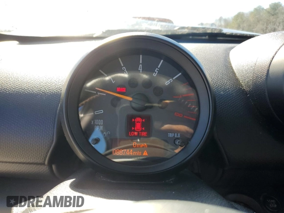 2015 MINI Countryman with VIN WMWZB3C50FWM33153, listed as a Copart auction lot 88238955 with 88,744 mi miles and Salvage Title. Bid and sale history available at DreamBid. Image 9.